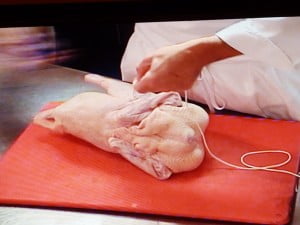 Pass needle through cavity and into opposite thigh - FG