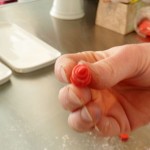 Pinch excess off back to 'open' petals