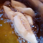 Fry over medium heat until golden, rising as they cook.