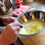 Temper the hot milk & the cold egg mixture.