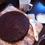 Brush cake with simple syrup.