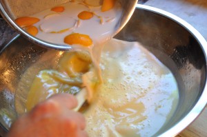 Combine hot milk with the cold eggs - Food Gypsy