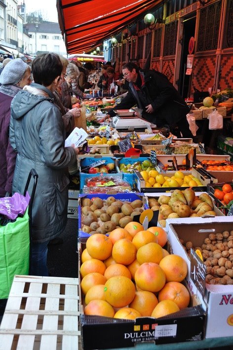 Produce stall, outdoors.  Dijon Market - Food Gypsy