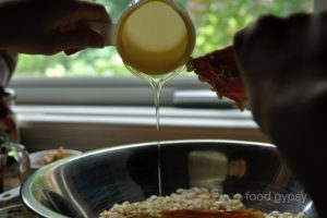 Step 2 & 3: add peanut butter, vanilla & honey, then mix.